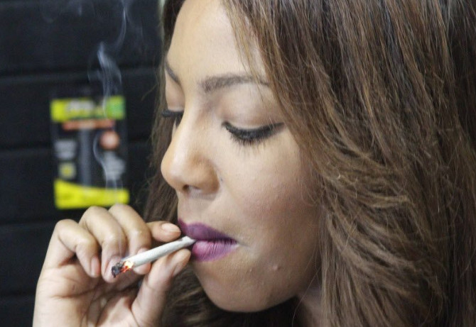 women smoking marijuana joint